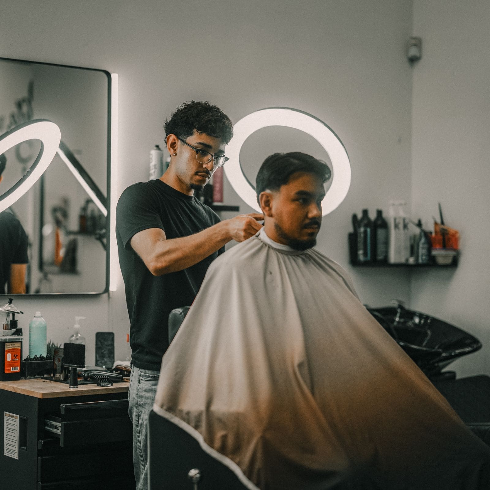 Jason cutting hair at Profile Hair Studios